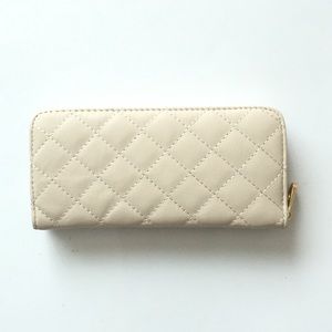 NEW Cream Colored Women’s Clutch